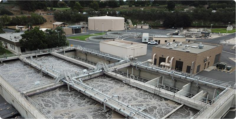 aerial shot landscape surrounded by mountains lakes with industrial disaster