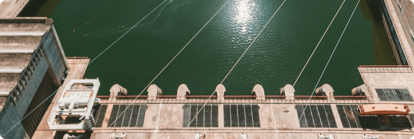 vertical shot river roads city clear blue sky